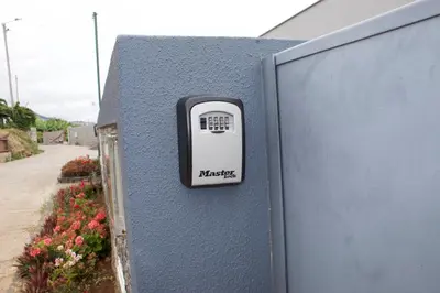 a blue wall with a mail box on it at Casa Bela Vista in Venda do Atalhinho