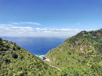 a view of the ocean from a mountain at Casa Leão de Ouro by LovelyStay in São Jorge