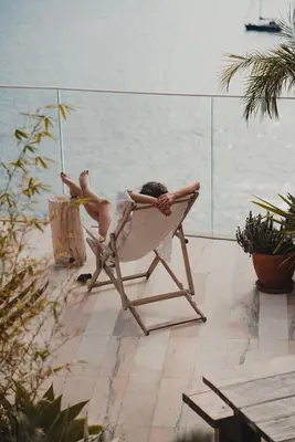 a swimming pool with a view of the water at Okulus Madeira in Funchal