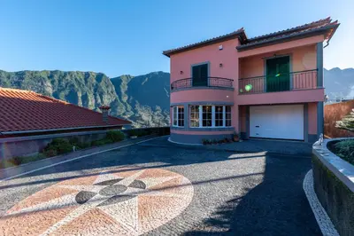 a villa with a view of the mountains at Cristina Grand in São Vicente
