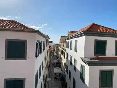 an overhead view of an alley between two buildings at Ribeira das Casas by Homie in Funchal