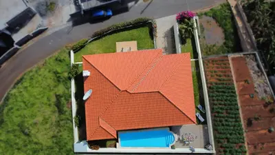an overhead view of a house with an orange roof at Casa Eleanor by LovelyStay in Calheta