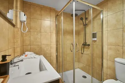 a bathroom with a shower and a sink at Ga281 in Funchal