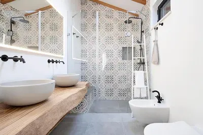 a bathroom with two sinks and a shower at Casas da Praia by Sevencollection in Salema