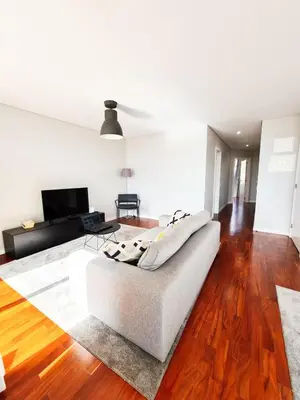 a living room with a couch and a table at Santa Luzia's Pearl V - Two Bed Apartment in Funchal