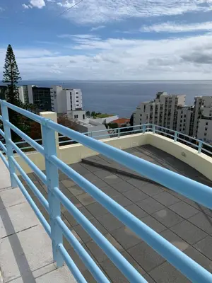a view of the ocean from the balcony of a building at Charming Lido Flat I in Funchal