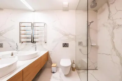 a bathroom with a shower and a toilet and a sink at Barreirinha Front-Line Sea View I by Holiday Rental Madeira in Funchal