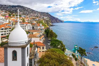 a view of the city of positano and the ocean at Barreirinha Front-Line Sea View II by Holiday Rental Madeira in Funchal