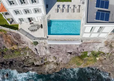 an overhead view of a pool between two buildings at Barreirinha Suite Top Floor by Holiday Rental Madeira in Funchal