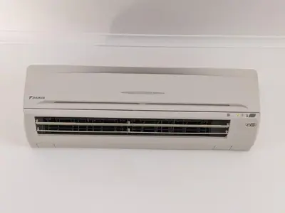 a white toaster oven sitting on a white table at Casa Monte Cristo Apartments - Almond in Lagos
