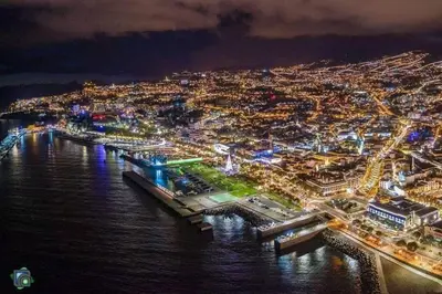 an aerial view of a city at night at Funchal Center Apartment II in Funchal