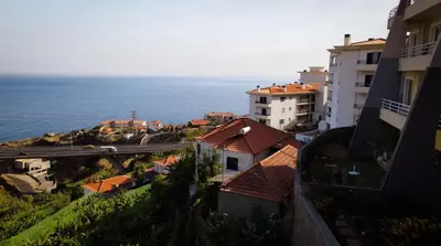 an aerial view of a city with the ocean at Sea View by Atlantic Holiday in Caniço