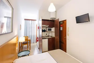 a bathroom with a shower and a toilet at Murças74 - Studio Apartments in Funchal