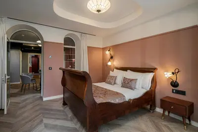 a bedroom with a large bed in a room at Madeira Gems Apartments in Funchal