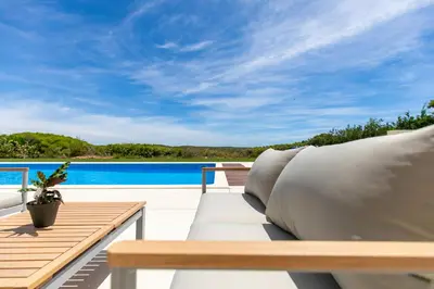 a view of a pool from the deck of a house at Sea View Villa in Sagres