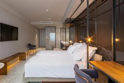 a view of the ocean from a hotel room at NEXT - by Savoy Signature in Funchal