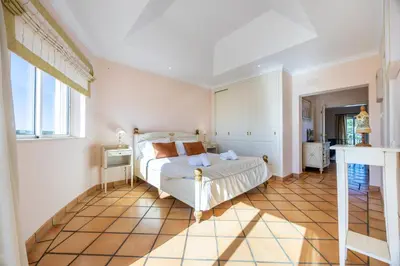 a bedroom with a bed in a room at Casa Gribouille in Sagres