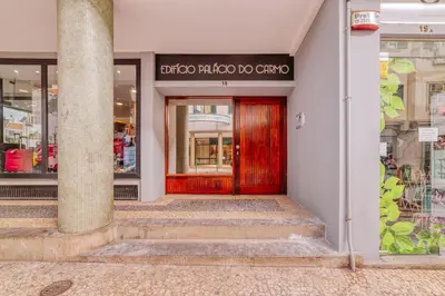 a red front door of a store at Madeira Xhic Apartment by Amazing Madeira in Funchal