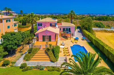 an aerial view of a house with a swimming pool at Villa Daisy by Villa Plus in Lagos