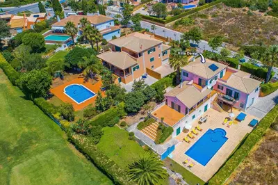 an aerial view of a house with a swimming pool at Villa Daisy by Villa Plus in Lagos