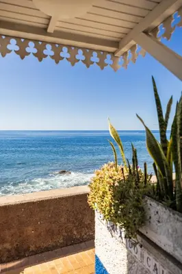 a view of the ocean from a balcony at Casa do Cais in Calheta