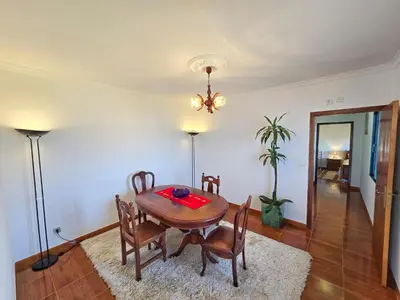 a dining room with a table and chairs at Maria Cottage Levada do Norte WiFi in Câmara de Lobos