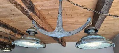a pair of lights hanging from a ceiling at Catavento in Porto Santo