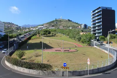 a park on top of a hill in a city at Angel's Apartment in Funchal