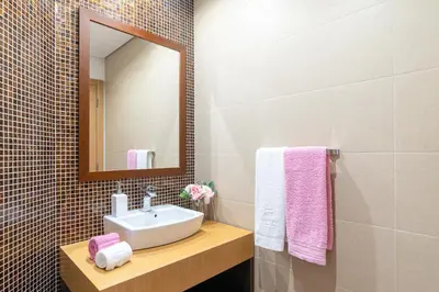 a bathroom with a sink and a mirror at Luxurious Apartment Funchal - Casa Valentina - Rent2U, Lda in Funchal