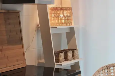 a shelf in a room with some baskets on it at Casa da Julia e Alice, a Home in Madeira in Funchal