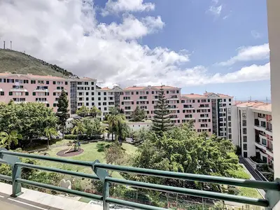 a view of a large apartment building from a balcony at Paradise Apartment by LovelyStay in Funchal