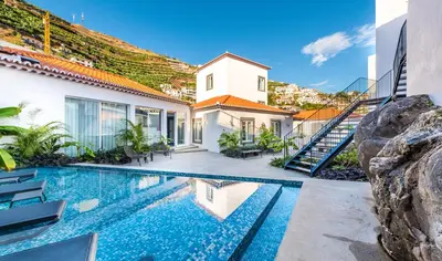 an image of a house with a swimming pool at Pestana Fisherman Village in Câmara de Lobos