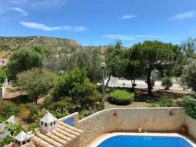 an image of a swimming pool in a yard at REFÚGIO DO CARANGUEJO - Praia da Luz - WiFi, Private Pool & BBQ in Luz