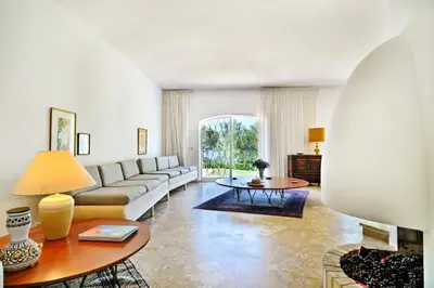 a living room with a couch and a table at Villa Sounia by Villa Plus in Lagos
