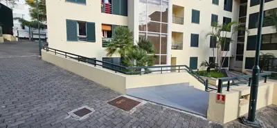 a building with a balcony with plants on it at Suncoast Residence V (Free parking) in Funchal