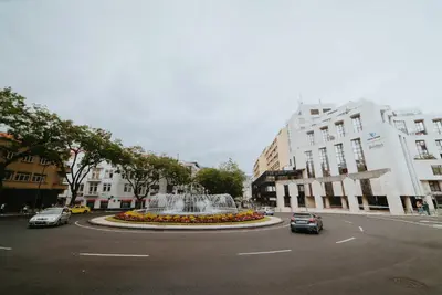 a large fountain in the middle of a city street at Rooftop Marina l by Madeira Best Apartments in Funchal