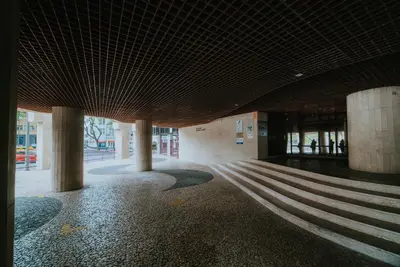 a hallway with a staircase in a building at Rooftop Marina ll by Madeira Best Apartments in Funchal
