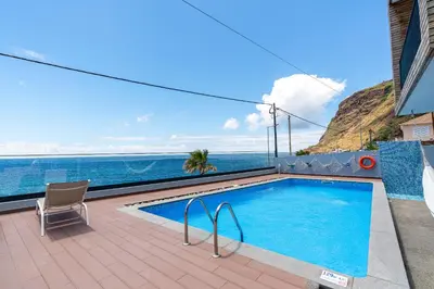 a swimming pool with a view of the ocean at Villa Sea - Rural Holiday Experience by SeaPearl in Paul do Mar