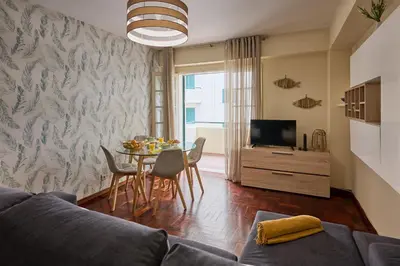 a living room with a couch and a table at Mon Coin Dans La Ville by Homie in Funchal