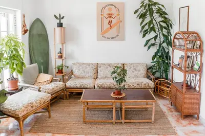 a living room with a couch and a table at LemonTree Eco Surfhouse in Sagres