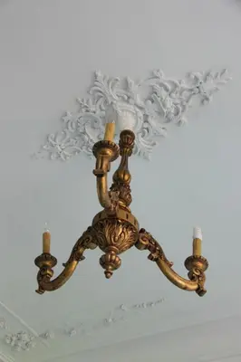 a chandelier hanging from a ceiling at Casa Grande Portugal in Burgau