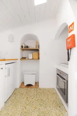 a bathroom with a toilet and a sink and a shower at Casa do Al-gharb in Raposeira