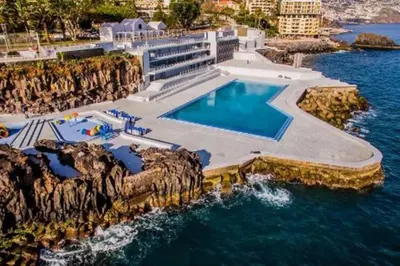 an aerial view of a resort in the water at Comfortable 2-Bedroom Apartment for Relaxing Stays in Funchal