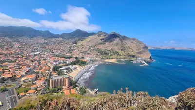 an aerial view of a city and a beach at Casa da Avó Duca in Machico