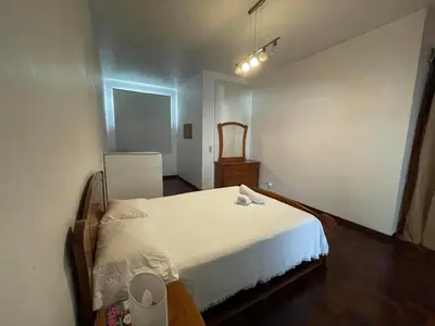 a bedroom with a large white bed in a room at Shining in Funchal