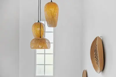 two lights hanging on a wall next to a mirror at Sea View Villa by Homie in Santa Cruz