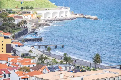 an aerial view of a city and the ocean at Sea View Villa by Homie in Santa Cruz