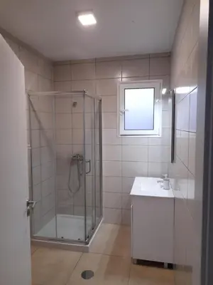 a bathroom with a shower and a sink at Casa Azul in Porto Santo