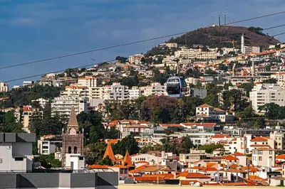 a view of a city with a mountain at Alegria III by An Island Apart in Funchal