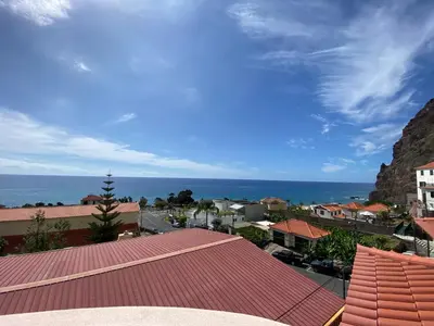 a view of the ocean from a roof at The Palms Apartment - Sun & Sea Madeira in Madalena do Mar